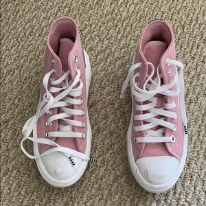 Pink Converse platform high tops